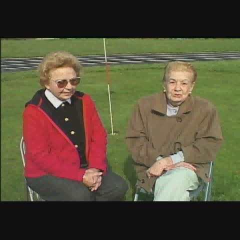 Photo of Eve Lipman with coach explaining the benifits of MABGA.